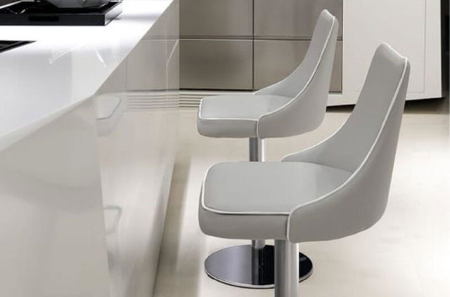 modern swivel barstool with chrome-metal frame and upholstered seat