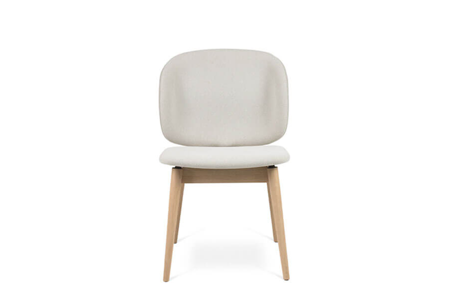 Artus dining chair with solid wood base and light sand fabric